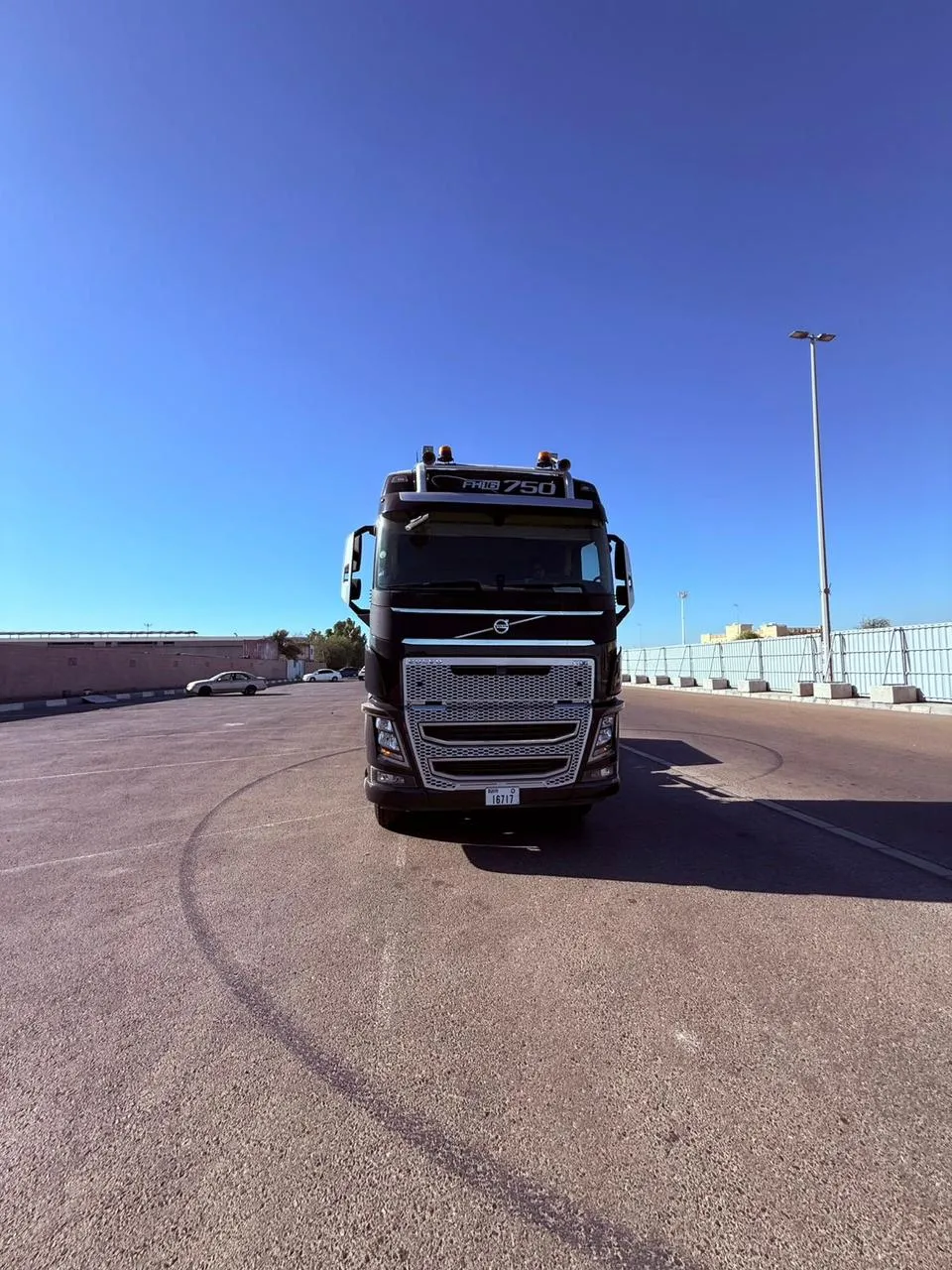 Volvo FH tractor unit coupled to a lowbed trailer